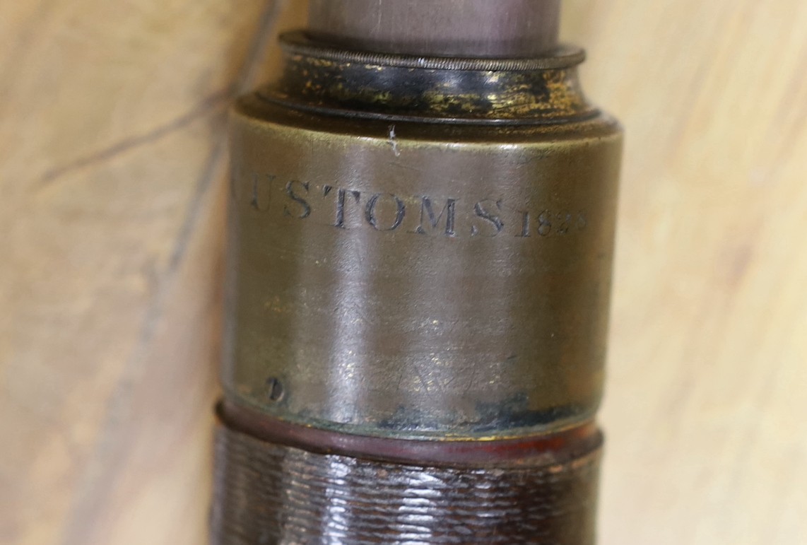 A single draw brass and leather Watkins & Hill telescope, total extended length 74.5cm